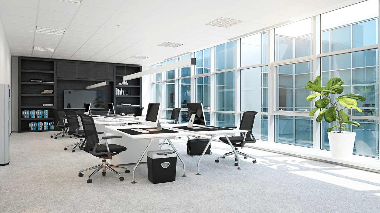 Conference Room with Table and Chairs By Large Windows